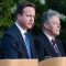 U.K. Prime Minister David Cameron (L) & Northern Ireland's First Minister Peter Robinson (R)